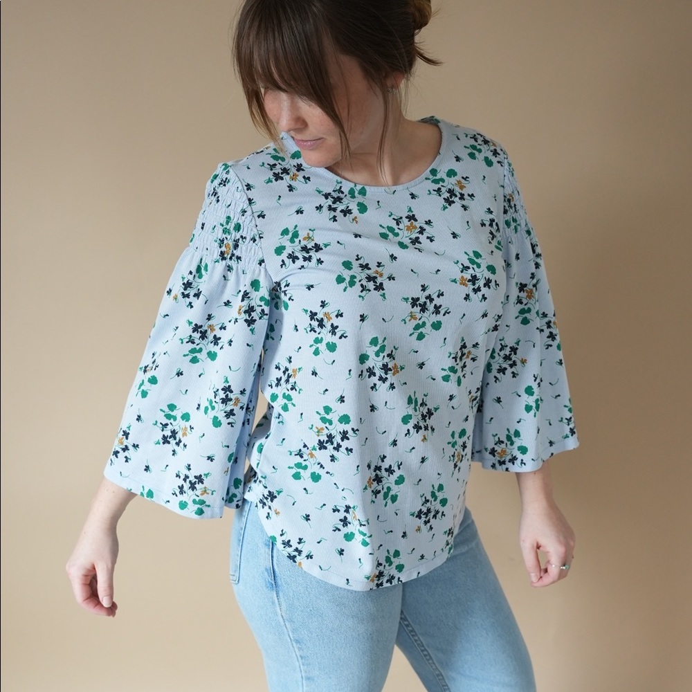 Ann Taylor light blue floral printed top.